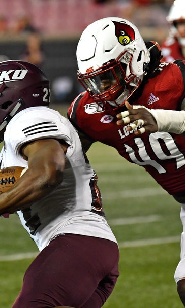 Louisville gets first win for Satterfield, beats EKU 42-0